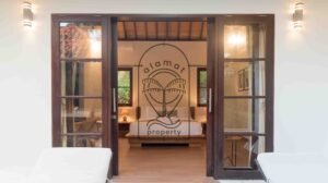 Bedroom entrance opening onto the pool terrace at Villa Bugenvil
