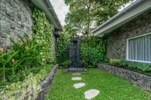 luxury Bali villa overlooking forest river and waterfall