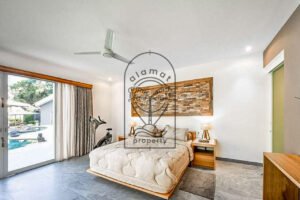 spacious bedroom with jungle view modern Bali villa
