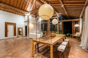 Wooden dining area in tropical Bali villa
