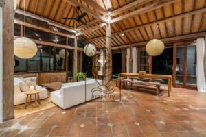 Wooden dining area in tropical Bali villa
