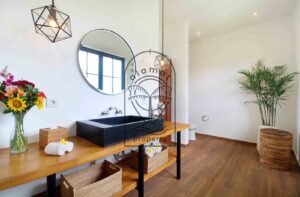Villa Melati en-suite bathroom with geometric pendant lights, Berawa Bali