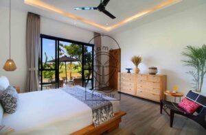 Villa Melati bedroom with sliding door to pool and garden, Berawa Bali