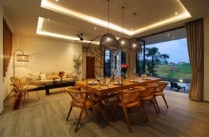 Villa Melati dining room at dusk with ricefield view, Berawa Bali