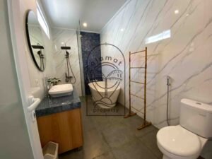 En-suite bathroom with modern fixtures and natural light at Villa Ramaia