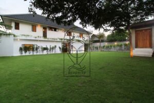Villa Melati garden exterior with manicured lawn, Berawa Bali