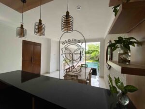 Open living area with Balinese-style decor at Villa Ramaia