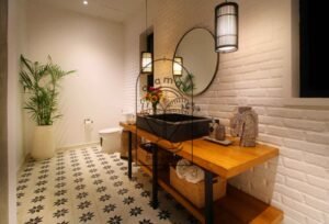 Villa Melati en-suite bathroom with wooden horse sculpture, Berawa Bali